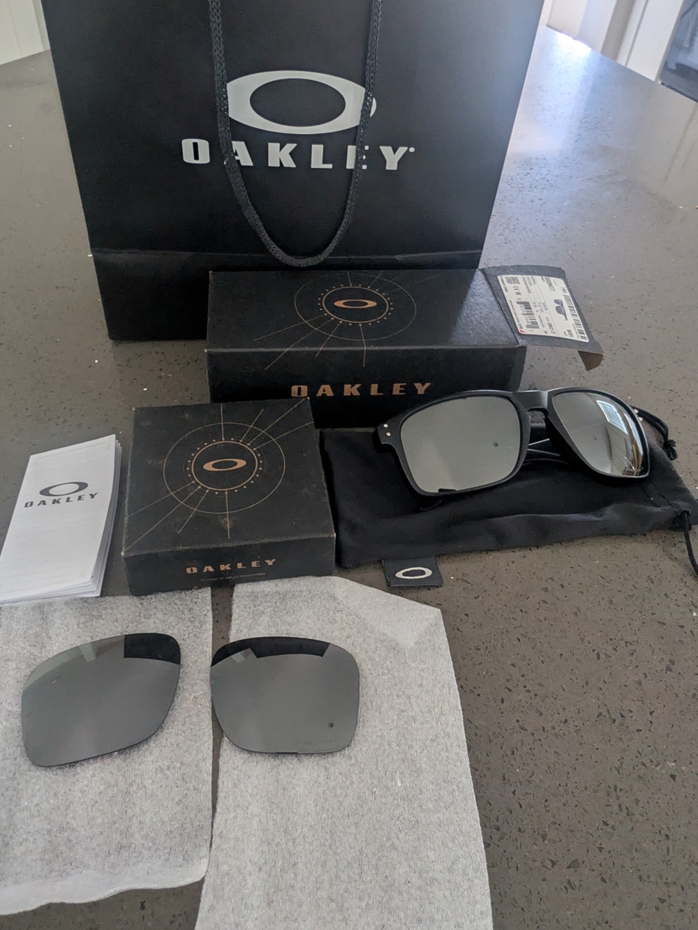 Oakley Men’s Black Frame Sunglasses with Silver Polarized Lenses/ Extra Replacem
